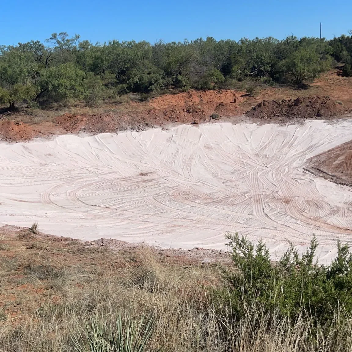 POND-WITH-BENTONITE-1152x1152 Bentonite in Dam Sealing